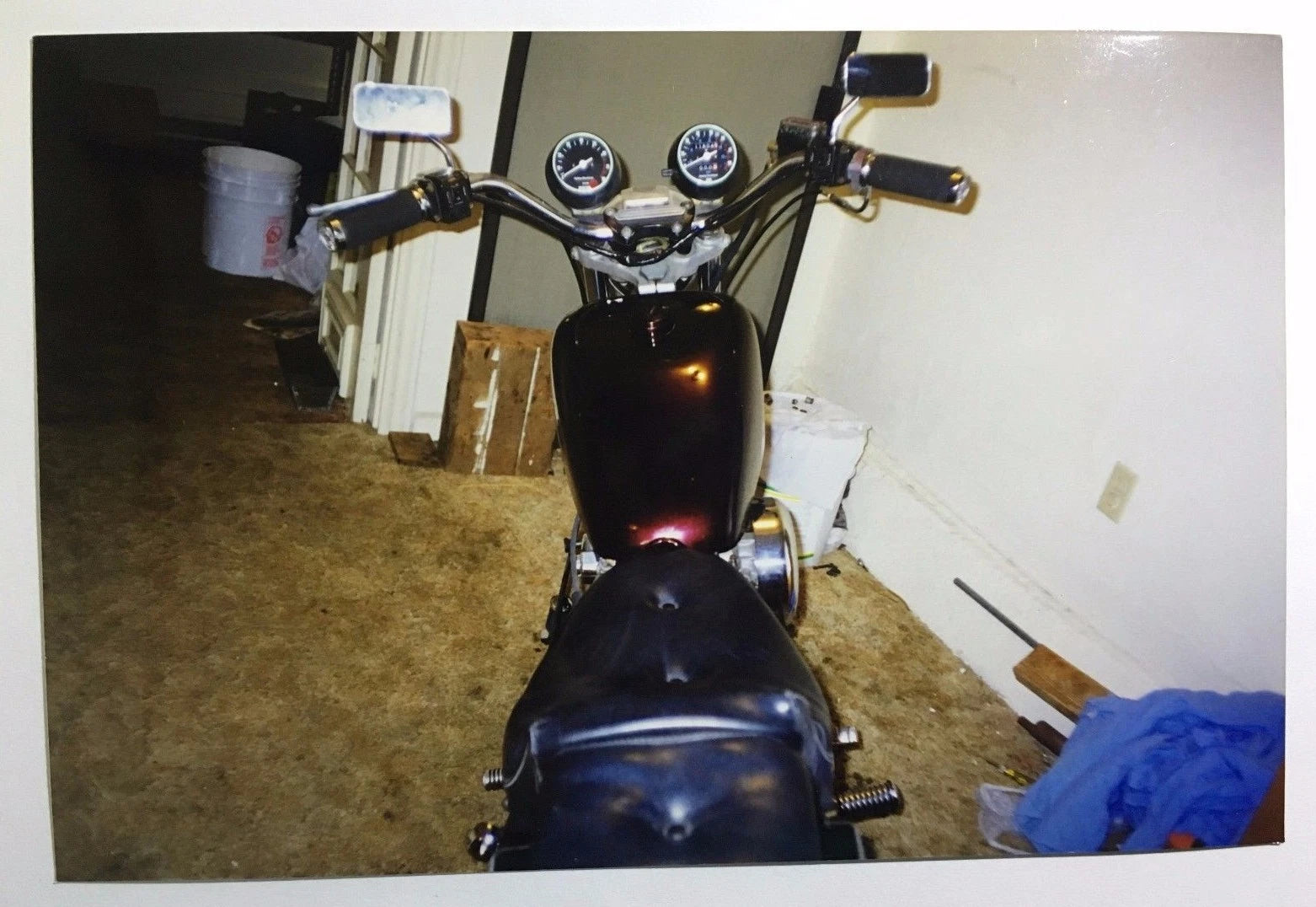 Vintage PHOTO of a Custom Harley Davidson Motorcycle Being Worked on Inside Home